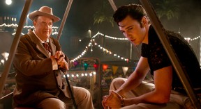 Tom Hanks as Colonel Tom Parker and Austin Butler as Elvis in Warner Bros. Pictures’ Elvis.