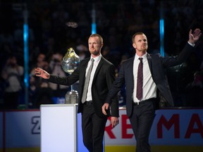 Former Vancouver Canucks forwards Henrik and Daniel Sedin at their jerseys retirements on Feb. 12, 2020.
