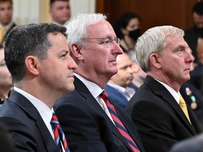 Former Assistant Attorney General for the Office of Legal Counsel Steven Engel (left), former Acting Attorney General Jeffrey A. Rosen (centre), and former Acting Deputy Attorney General Richard Donoghue (right) testify during the fifth hearing by the House Select Committee to Investigate the January 6th Attack on the U.S. Capitol in the Cannon House Office Building in Washington, D.C., Thursday, June 23, 2022.