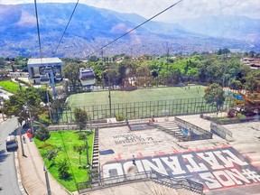 View of soccer pitch built next to one of Medellín's cable car stations that underscores the city's mindset that public transit can be used to enliven neighbourhoods. SUPPLIED