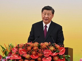 China's President Xi Jinping gives a speech following a swearing-in ceremony to inaugurate the city's new leader and government in Hong Kong, Friday, July 1, 2022, on the 25th anniversary of the city's handover from Britain to China.