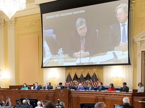 A video image of then attorney general William Barr is seen on a screen during a House Select Committee hearing to Investigate the January 6th Attack on the US Capitol, in the Cannon House Office Building on Capitol Hill in Washington, DC on June 9, 2022.