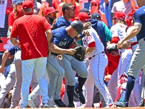 Jun 26, 2022; Anaheim, California, USA;  The Los Angeles Angels and Seattle Mariners cleared the benched during a brawl in the second inning at Angel Stadium.