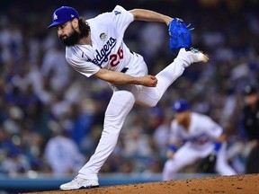 June 2, 2022; Los Angeles, California, USA; Los Angeles Dodgers starting pitcher Tony Gonsolin throws against the New York Mets during the sixth inning at Dodger Stadium.