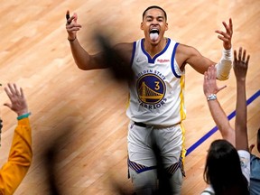 Jun 13, 2022; San Francisco, California, USA; Golden State Warriors guard Jordan Poole (3) reacts after making a shot at the end of the third quarter against the Boston Celtics in game five of the 2022 NBA Finals at Chase Center.