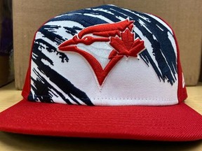 The Toronto Blue Jays have altered the design of an upcoming special edition cap, seen in an undated handout photo, which they are set to wear on the Fourth of July.