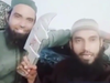 A screengrab from video of two men claiming to be responsible for the beheading of a Hindu tailor in India.