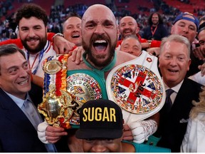 Tyson Fury celebrates after winning his fight against Dillian Whyte.