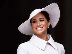 Meghan, Duchess of Sussex smiles after attending a service of thanksgiving for the reign of Queen Elizabeth at St Paul's Cathedral in London June 3, 2022 to mark the Platinum Jubilee.