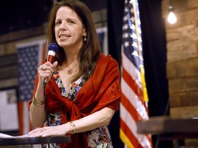 Dr. Simone Gold speaks to a large crowd inside The Elephant in the Room in Jenks during a Frontline Doctor's Uncensored Truth Tour event on Wednesday, June 30, 2021.