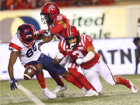 Calgary Stampeders Branden Dozier breaks up a pass intended for B.J. Cunningham of the Montreal Alouettes during CFL football in Calgary on Friday, August 20, 2021.