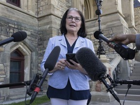Cathay Wagantall speaks with reporters outside West Block in the Parliamentary precinct in Ottawa, Friday, June 3, 2022.