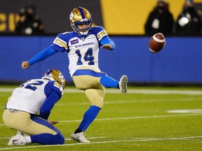 Winnipeg Blue Bombers kicker Sergio Castillo (14) kicks a field goal against the Hamilton Tiger-Cats during second half football action in the 108th CFL Gray Cup in Hamilton, Ont., on Sunday, December 12, 2021.