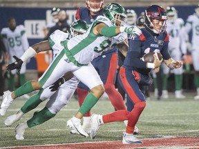 Montreal Alouettes quarterback Matthew Shiltz (18) is sacked by Saskatchewan Roughriders' Pete Robertson during first half CFL football action against the in Montreal, Saturday, October 30, 2021.
