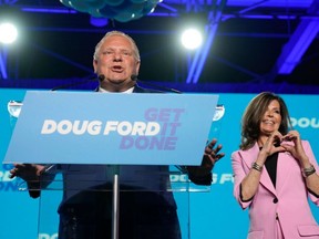 Ontario Premier Doug Ford and his wife, Karla, react after winning Thursday's election.