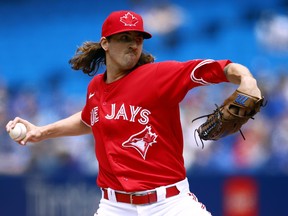 Kevin Gausman of the Toronto Blue Jays delivers a pitch in the first inning during a game against the Minnesota Twins at Rogers Centre on June 5, 2022 in Toronto.