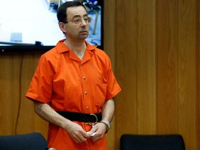 Larry Nassar, a former team USA Gymnastics doctor who pleaded guilty in November 2017 to sexual assault charges, stands in court during his sentencing hearing in the Eaton County Court in Charlotte, Michigan, U.S., February 5, 2018.