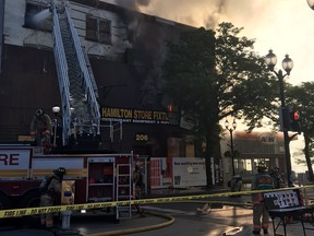 Hamilton firefighters battled a blaze at a four-storey commercial building at 206 King St. W. on Saturday, June 18, 2022.