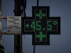 This photograph taken on June 16, 2022, shows a sign of a pharmacy displaying the temperature in Toulouse, southwestern France.