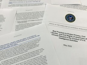 A report issued by the Office of the Director of National Intelligence is photographed in Washington, June 14, 2022. As America's intelligence agencies ramp up efforts against China, top officials acknowledge they may also end up collecting more phone calls and emails from Chinese Americans, raising new concerns about spying affecting civil liberties. The new report makes several recommendations, from expanding unconscious bias training to reiterating internally that federal law bans targeting someone solely due to their ethnicity.