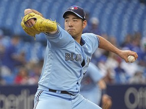 Toronto Blue Jays starting pitcher Yusei Kikuchi throws a pitch against the Tampa Bay Rays during the first inning at Rogers Centre on June 30, 2022.