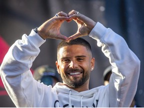 Italian National Team star Lorenzo Insigne is greeted by fans in Little Italy after arriving  in Toronto, Ont. on Friday June 24, 2022.