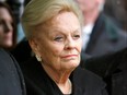 Loretta Rogers watches as the casket of her late husband Ted Rogers, president and CEO of Rogers Communications, arrives for funeral services in Toronto, Dec. 9, 2008.