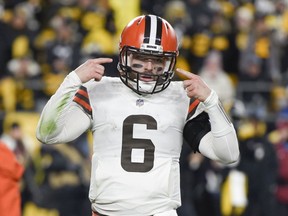 FILE - Cleveland Browns quarterback Baker Mayfield (6) gestures during the second half an NFL football game against the Pittsburgh Steelers, Monday, Jan. 3, 2022, in Pittsburgh. Baker Mayfield said the Cleveland Browns have work ahead if they want him to help them through their situation with Deshaun Watson. Mayfield, speaking at his football camp near the University of Oklahoma's campus on Tuesday, June 28, didn't entirely close the door on stepping in if needed.