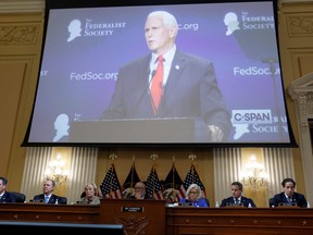 Former U.S. vice-president Mike Pence speaks about the January 6 attack on the U.S. Capitol during an address to the Federalist Society in a video during the public hearing of the U.S. House Select Committee to Investigate the January 6 Attack on the United States Capitol, on Capitol Hill in Washington, June 9, 2022.