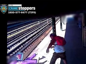NYPD shared a video showing a man push a woman off the subway platform in New York City.