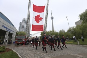 21 New Names Added To Toronto Fallen Firefighter Memorial Toronto Fire Service Pipes and Drums lead the procession on Sunday, June 12, 2022. JACK BOLAND/TORONTO SUN