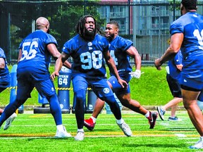 Rush end Jachai Polite (98) works out during a recent Argos practice. The 24-year-old former NFLer will make his Double Blue debut on Saturday night in B.C.