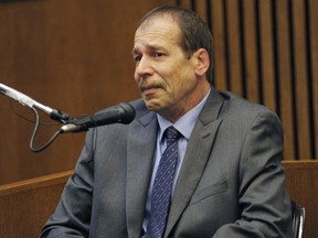 Ted Wafer, of Dearborn Heights, Mich., testifies in his own defence during his second-degree murder trial in Detroit on Aug. 4, 2014.