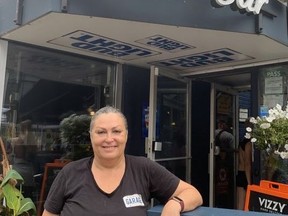 Fatima DeOliveira, owner of Church Street Garage, said she had a nervous breakdown because of pandemic difficulties. She was relieved to see the return of the Pride parade.