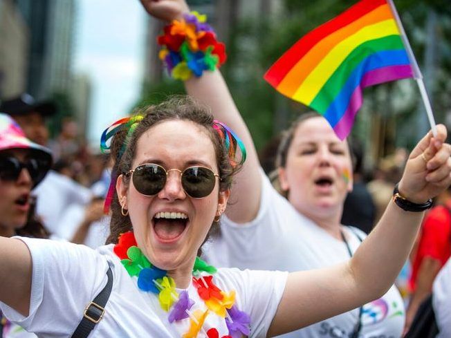 Tens of thousands throng downtown Toronto as Pride parade returns ...