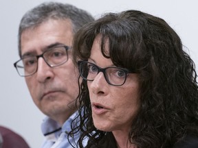 Tracy Wing, mother of Riley Fairholm, responds to a question as Cesur Celik, father of Koray Kevin Celik, looks on during a news conference in Montreal on Monday, Sept. 16, 2019.