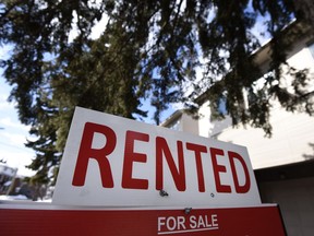 A for sale sign outside a home indicates that it has been rented, in Ottawa, on Monday, March 1, 2021.