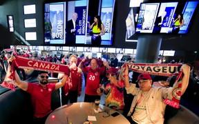 Soccer fans celebrate the announcement that Toronto will be a host city to some of the FIFA World Cup games in 2026 on Thursday, June 16, 2022.