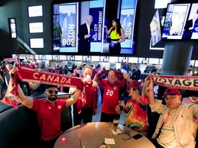 Soccer fans celebrate the announcement that Toronto will be a host city to some of the FIFA World Cup games in 2026 on Thursday, June 16, 2022.