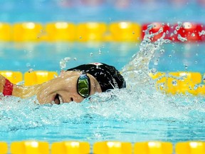 Penny Oleksiak of Canada competes during her women's 200m freestyle heat at the 19th FINA World Championships in Budapest, Hungary, Monday, June 20, 2022.