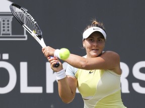 Canada's Bianca Andreescu returns a ball to Italy's Martina Trevisan during the WTA Tour singles match in Bad Homburg, Germany, Tuesday June 21, 2022.