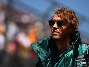 MONTREAL, QUEBEC - JUNE 19: Sebastian Vettel, of Germany and the Aston Martin F1 Team, looks on from the drivers' parade ahead of the F1 Grand Prix of Canada at Circuit Gilles Villeneuve on June 19, 2022 in Montreal, Quebec.