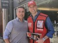 Man taking photo with Prince William.