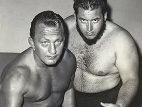 Buddy “Nature Boy” Rogers and Gorilla Monsoon.