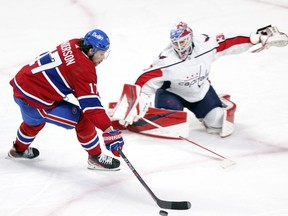 Montreal Canadiens winger Josh Anderson has the puck poked away from him by Washington Capitals Ilya Samsonov during second period in Montreal on Feb. 10, 2022.