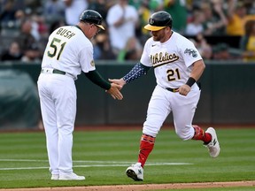 Stephen Vogt of the Oakland Athletics runs around the bases after hitting a home run in the bottom of the sixth inning against Alek Manoah of the Toronto Blue Jays on July 4, 2022 in Oakland.