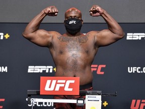 In this UFC handout, Derrick Lewis poses on the scale during the UFC weigh-in at UFC APEX on February 19, 2021 in Las Vegas, Nevada.