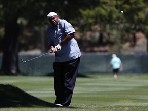Sports analyst Charles Barkley makes a play on the 18th green during Round Two of the 2022 American Century Championship at Edgewood Tahoe Golf Course on July 9, 2022 in Stateline, Nevada.