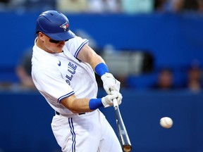 Matt Chapman #26 of the Toronto Blue Jays hits an RBI double in the fourth inning against the Philadelphia Phillies at Rogers Centre on July 12, 2022 in Toronto, Ontario, Canada.