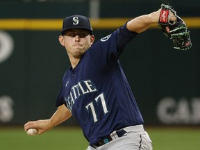 Chris Flexen of the Seattle Mariners pitches against the Texas Rangers during the second inning at Globe Life Field on July 17, 2022 in Arlington, Texas.